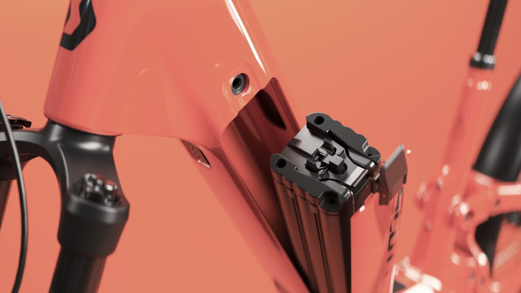 Batterie Bosch PowerTube amovible extraite par le côté du cadre du Scott E-Ville