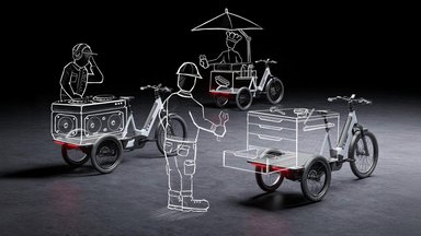 Cube Trike Hybrid en version à plateforme arrière, vélo cargo compact conçu pour le transport urbain.