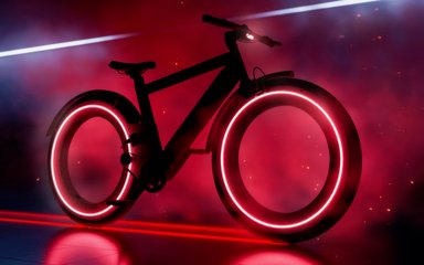 Vélo électrique futuriste Noll Go avec roues sans rayons en circulation sur route urbaine