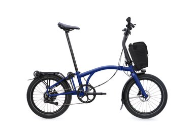 Vélo pliant électrique Brompton Electric G Line City+ 2026 avec cintre en U, selle large et pneus ville