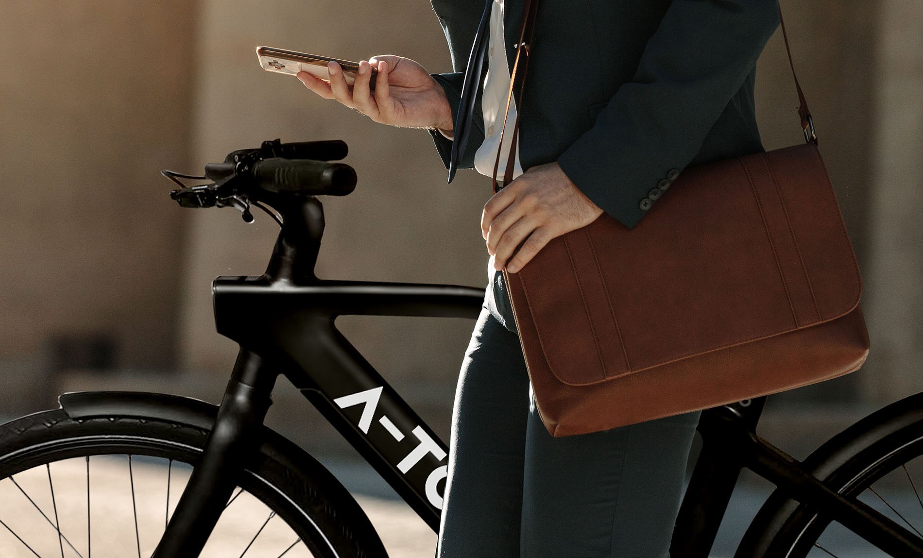 Businessman,Looking,At,His,Mobile,Phone,While,Walking,On,Street