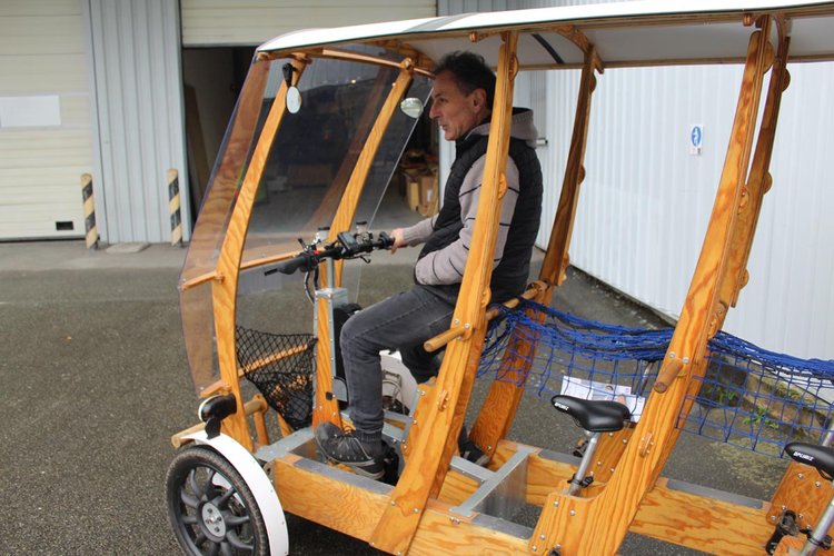 Jean-François Robert dans un Woodybus