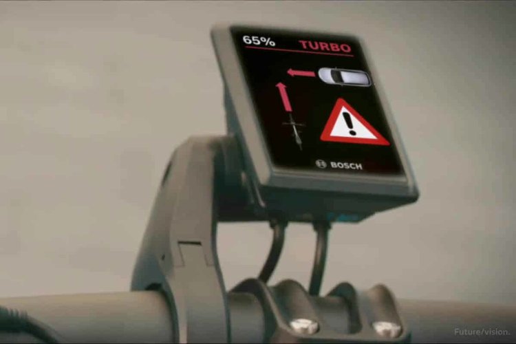Écran Bosch affichant une alerte V2X d’angle mort pour vélo électrique