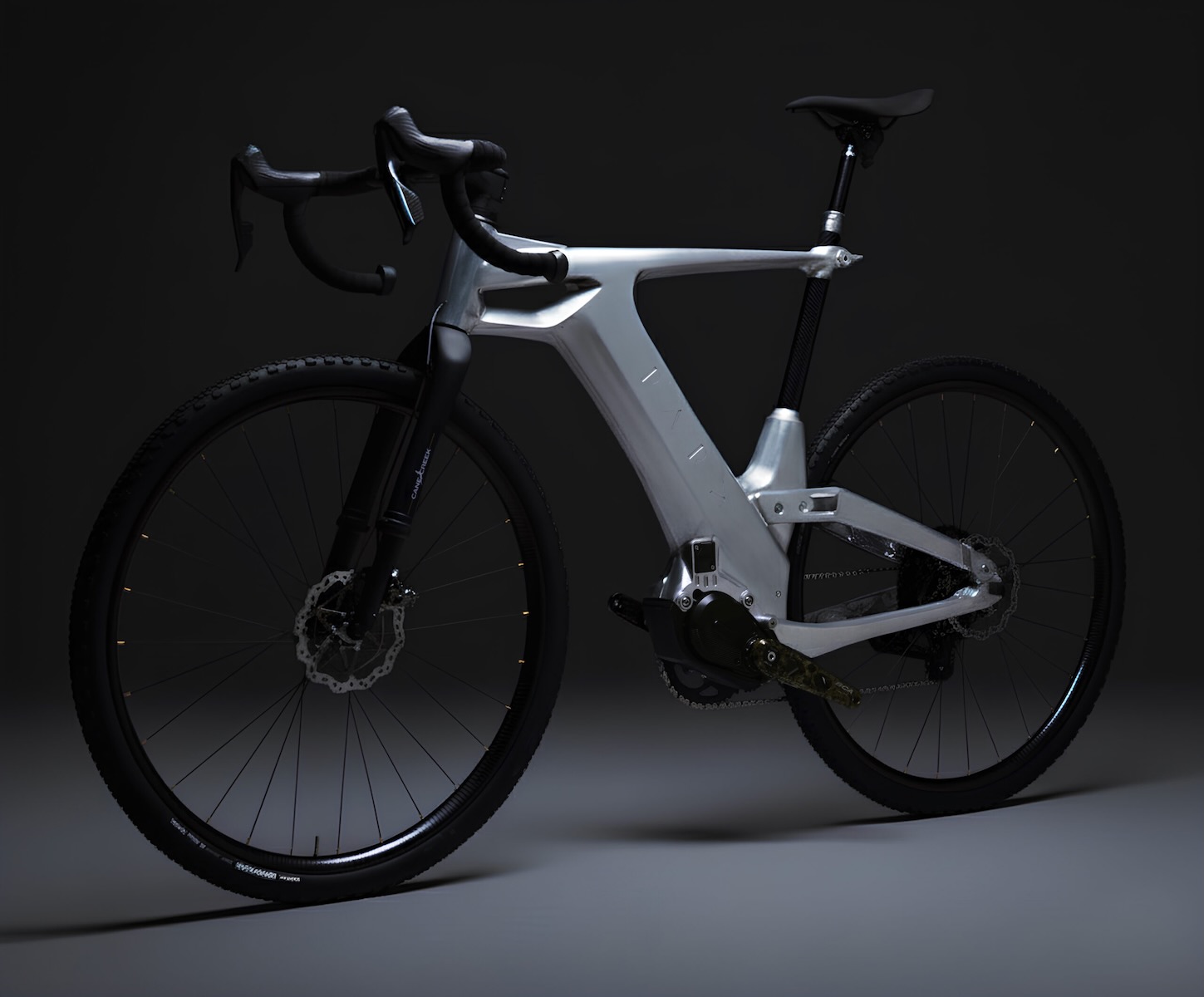 Impervia : le gravel électrique au design futuriste - Actualité 2 Détail du cadre carbone brut de l'Impervia montrant les finitions artisanales