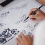 Concept Zero Lompico sur le stand de la marque à l’EICMA 2025, signature LED et design de roadster futuriste